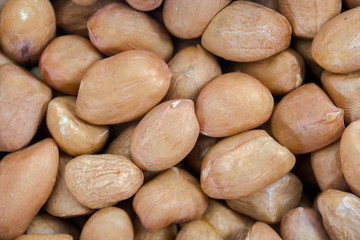 Obraz premium Peanuts / Abstract background of dry peanuts.