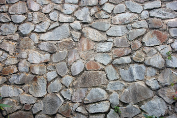 stone masonry wall from old dilapidated shabby rubble foreground