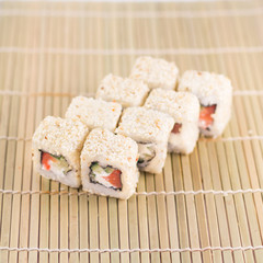 Isolated sushi / rolls.