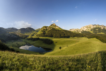 Fototapeta na wymiar Orlovacko lake in Sutjeska national park Zelengora mountain