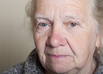 Portrait of an elderly woman. Closeup view