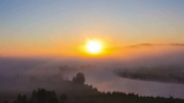 timelapse morning mist over the river and the valley