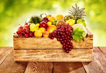 Zelfklevend Fotobehang Wooden crate filled with fresh healthy fruit © exclusive-design