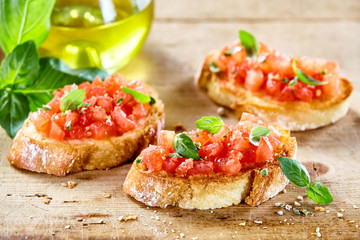 Tasty savory tomato Italian appetizers - obrazy, fototapety, plakaty