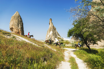 Horseback riding through the national Park in Cappadocia, Turkey © vesta48