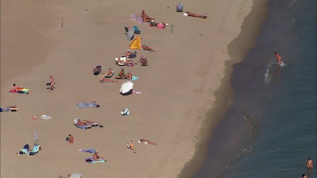 People Enjoying The Seaside At Serignan Plage