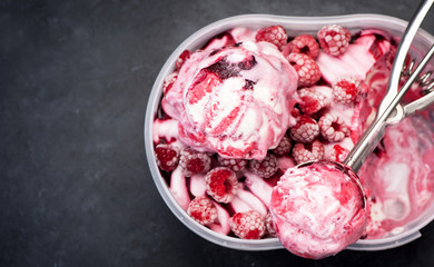 Raspberry ice cream sorbet and spoon for ice cream