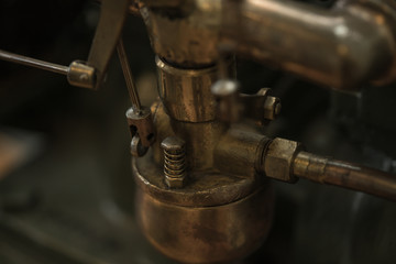 Outdated antique handmade boatmotor