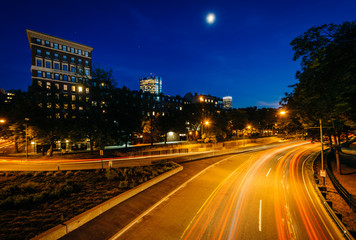 Fototapeta premium Long exposure of traffic along Storrow Drive at night, in Beacon