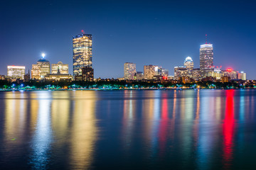 Fototapeta na wymiar The Charles River and buildings in Bay Back at night, seen from