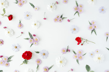 round frame wreath pattern with roses, pink flower buds, branches and leaves isolated on white background. flat lay, top view