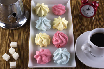 Meringue Cookies and cup of coffee.