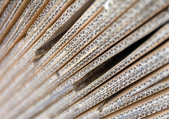 Brown corrugated cardboard useful as a blurred background