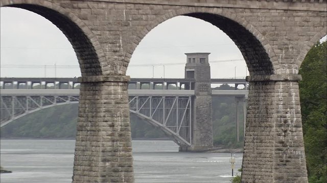Reveal Shot Of Two Bridges Across Menai Straits