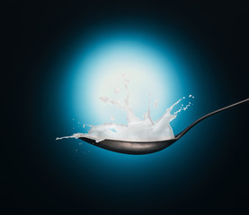 Splash of milk in a spoon