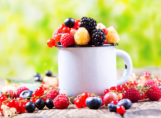 fresh berries on wooden table