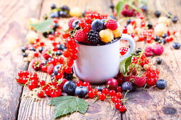 fresh berries on wooden table