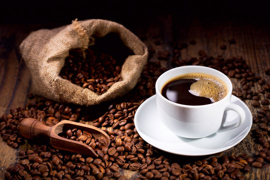 Fototapeta cup of coffee with beans