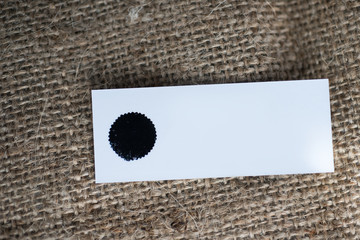 Plain product label with copy space shot on hessian background