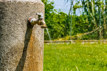 old rusty faucet leaks
