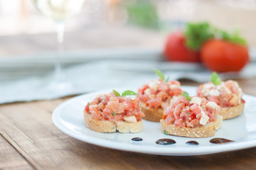 Dakos, Bruschetta  with tomato, greek cheese feta and basil