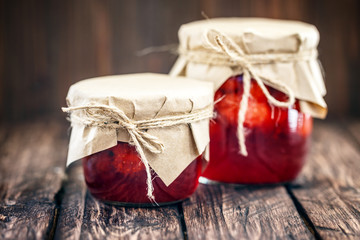 Strawberry jam on a wooden