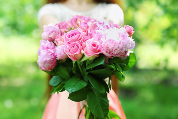 Girl with fresh bouquet, closeup
