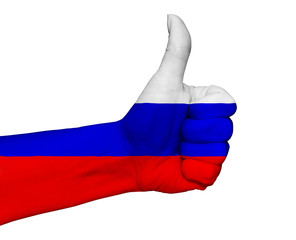 Hand with thumb up painted in colors of Russia flag isolated