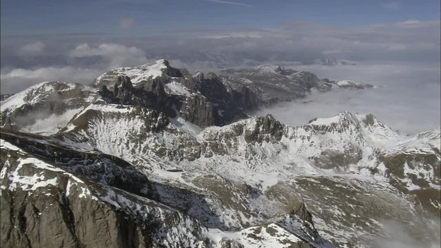 Mountain Range Above Clouds