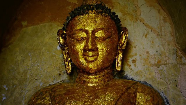Video 1920x1080 - Face of the stone Buddha statue close-up. Bagan, Myanmar