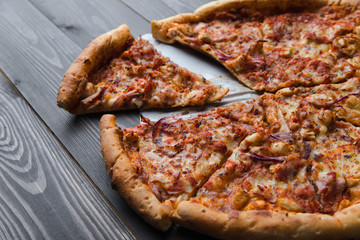 pizza on a wooden background