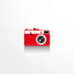 Old camera. Vector icon.