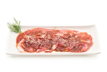 fresh pork sliced with sauce and sesame