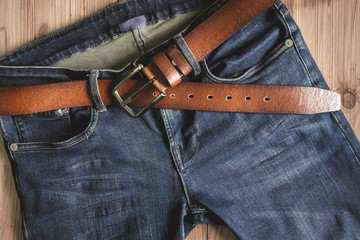 Blue jeans with leather belt vintage color