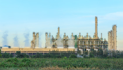 Oil refinery plant with blue sky for energy industry background.
