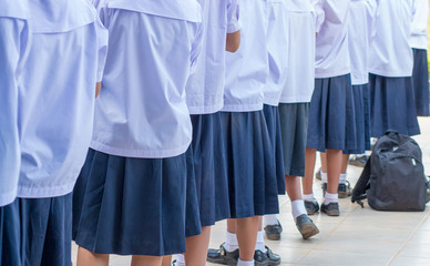 Thailand secondary education students are standing in line in mo
