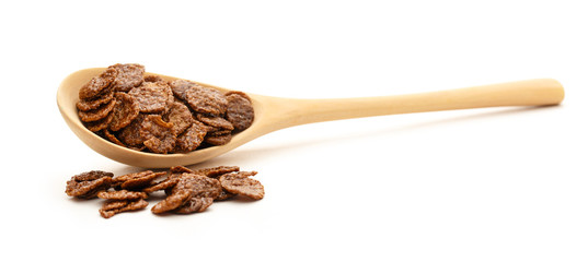 Chocolate corn flakes on wooden spoon