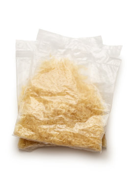 Packages of dry white rice