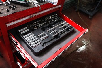 Kit of repairing tools in workshop. Small garage toolbox, handyman, hobby concept