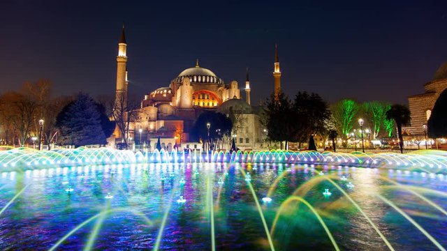 Hagia (Aya) Sophia -a historical monument in Istanbul at night. Timelapse view.