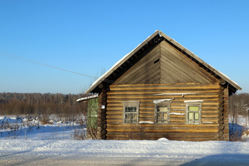 House in a village in a winter day