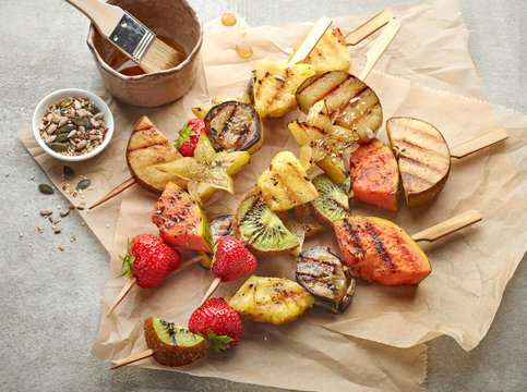 grilled fruit pieces on wooden skewers