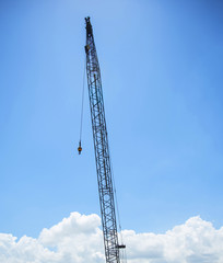 Mobile crane with background blue sky 