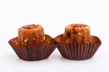 Delicious candies anthill isolated on white background.