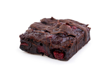 Delicious vegetarian brownie with cherries isolated on white bac