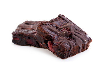 Delicious vegetarian brownie with cherries isolated on white bac