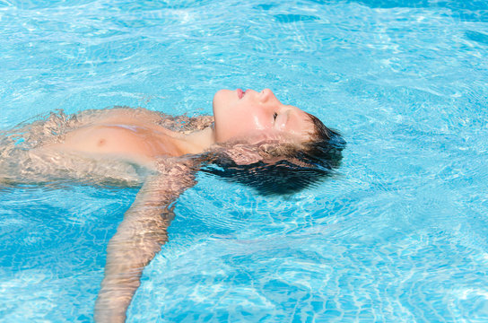 teen in swimming pool
