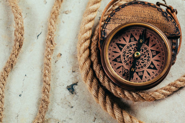 Compass on a gray gradient background