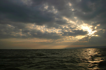 dramatic clouds over the water