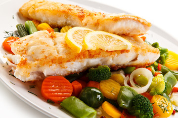 Fish dish - fried fish fillet and vegetables 